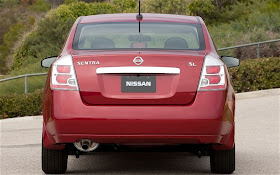 Rear view of red 2011 Nissan Sentra sedan parked