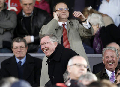 Alex Ferguson watches from the stand ahead against Bolton Wanderers