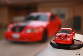 2000 Ford Mustang GT with matching Johnny Lightning Toy Car