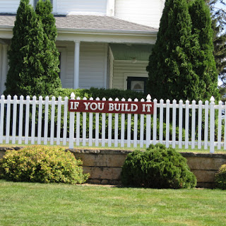 The house in Field of Dreams with sign on fence saying "If You Build It"