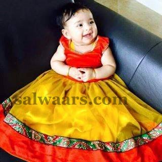 Baby in Rich Mustard Net Lehenga 