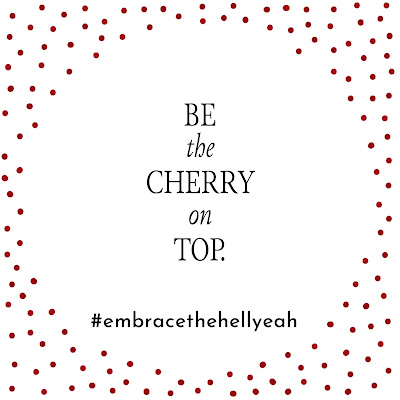 Inspirational quote in black letters on a white background surrounded by tiny red polka dots.