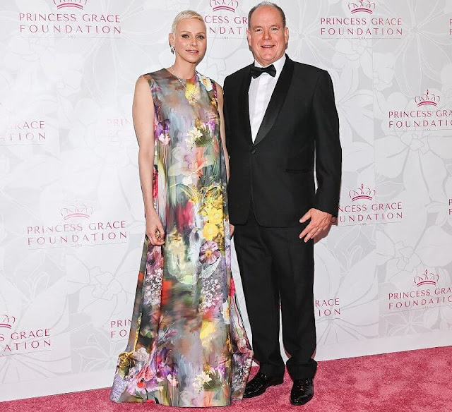 Princess Charlene wore a new Terrence Bray Dress, which featured a beautiful floral design all over the gown. Dior diamond earrings