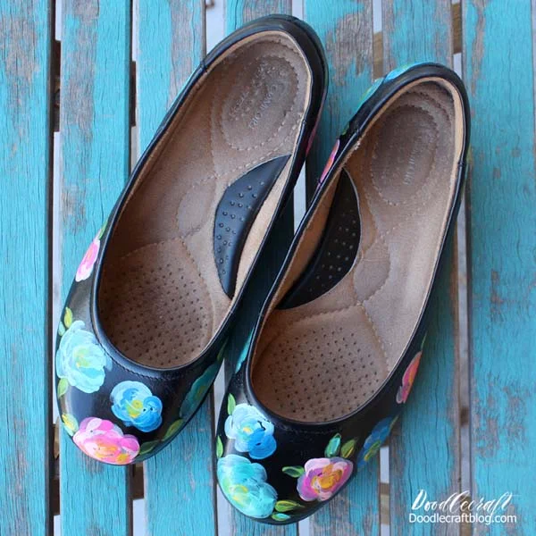 I adore painting shoes.  Especially shoes that have seen better days.  These shoes were scuffed and marked up...but still very comfortable.  They just needed an update!  Brightly colored florals are the answer, they are easy to paint and anyone can do it!