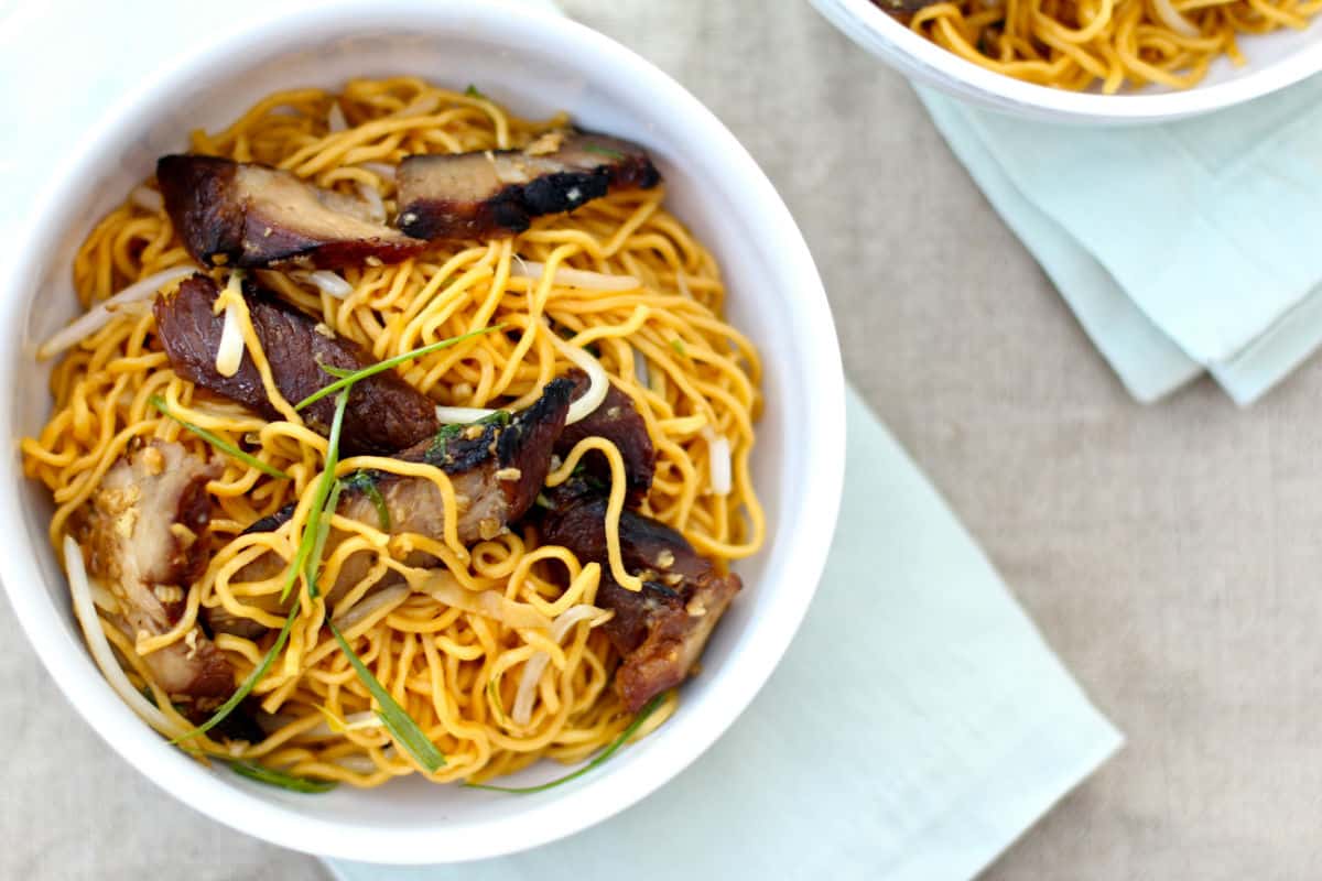 Barbecued Pork Lo Mein with egg noodles in soup bowls.