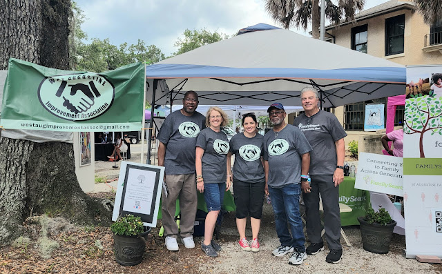 Willie Cooper, Sr., Lisa Lewis, Dewin Barnette from the West Augustine Improvement Association with Joseph Anderson from Family Search at the Juneteenth Festival in Lincolnville, St. Augustine, Florida