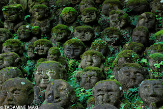 Many relaxing stone images at Otaginenbutsu-Ji temple, in Kyoto, Japan<br />