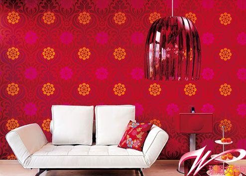 red wallpaper for living room. Red wallpaper + red chandelier, they make the living room very festive.