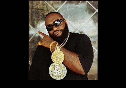 rick ross tattoos on his hand. images rick ross tattoos on