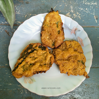 Sewali paat or night jasmine flowering leaves are long and hairy leaves with a bitter taste. For those who love bitter food items,  xewali pator bor is a good choice. The night jasmine flowering leaves are dipped into a spicy batter and then dip fried in oil. You can enjoy this fritter as a snack or serve it as a side dish with rice in lunch or dinner.