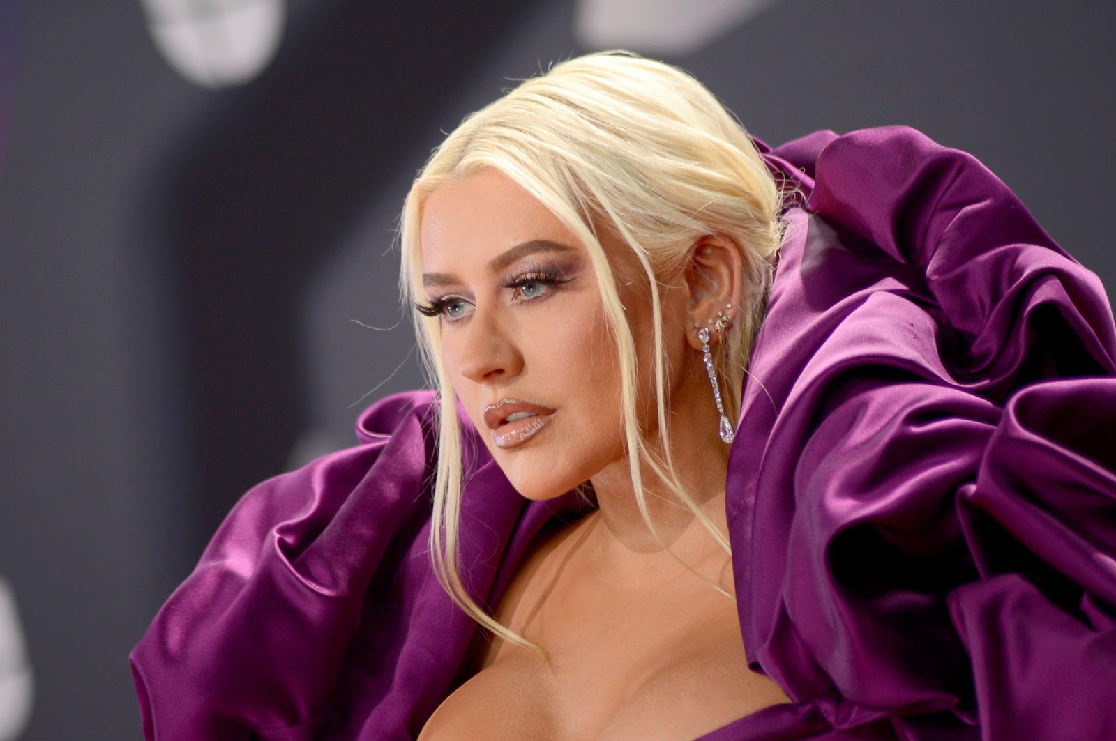 Christina Aguilera In Purple Gown With Dramatic Ruffled Collar & Invisible Heels at Latin Grammy Awards 2022