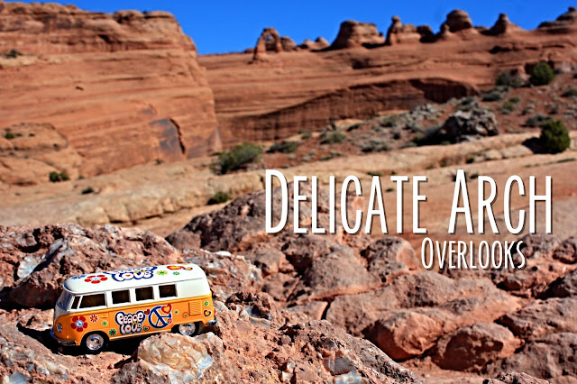 Title card showing the yellow van with the Delicate Arch landscape