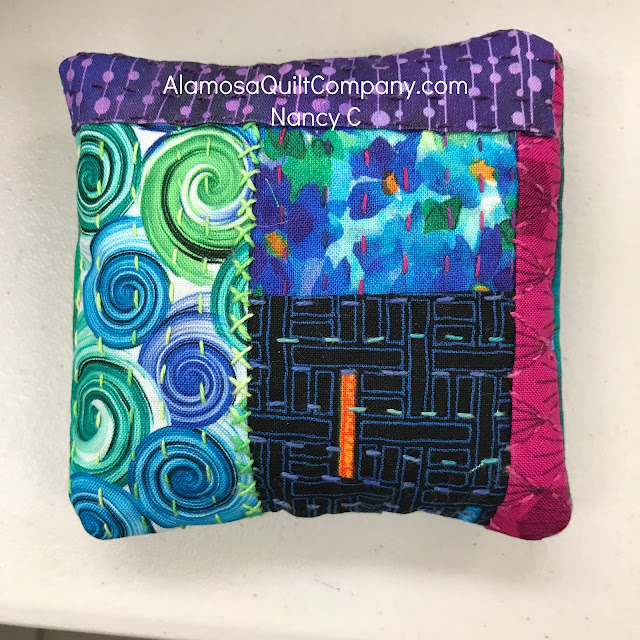 Nancy C's stitched meditations pin cushion