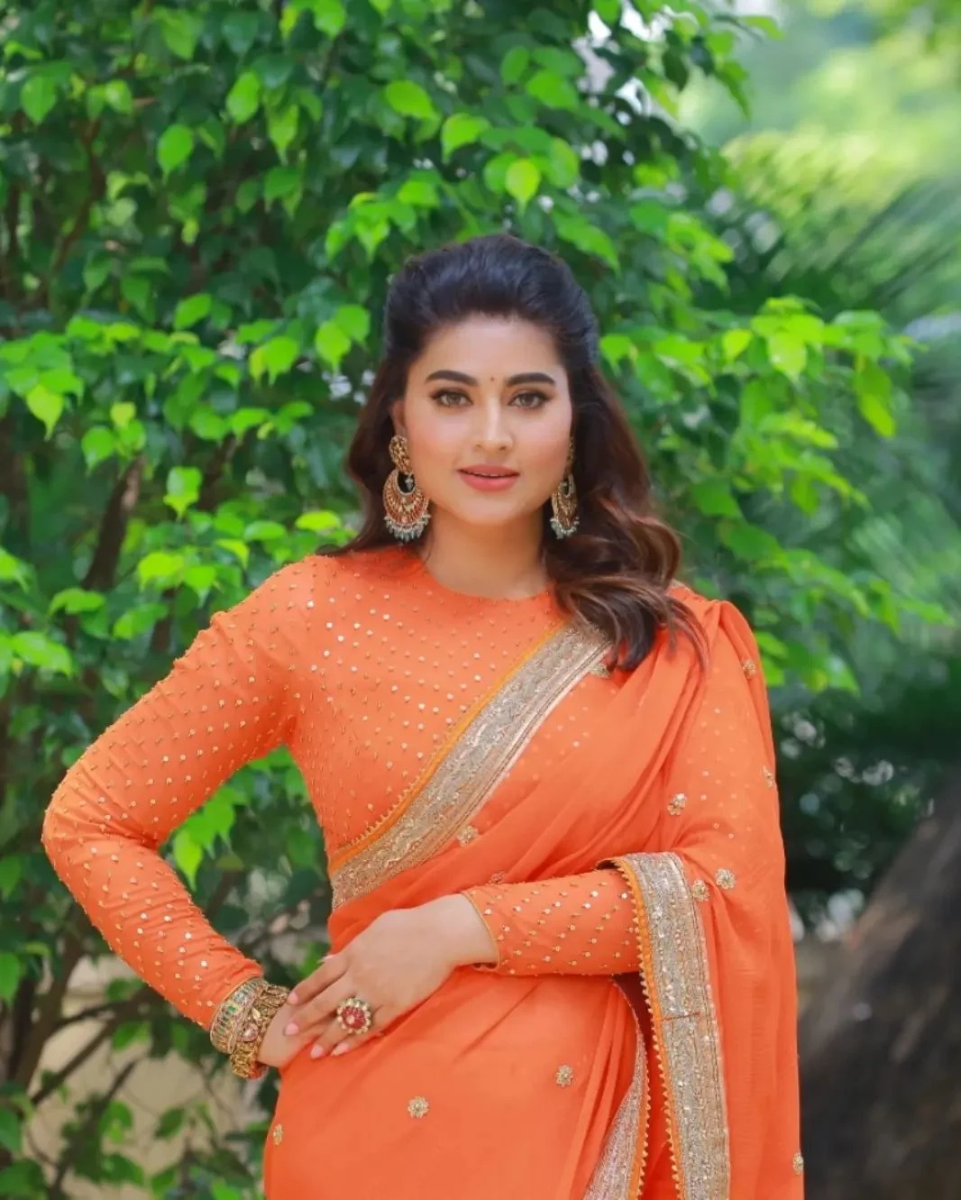 Actress Sneha Adorable Looks in Orange Saree Pics