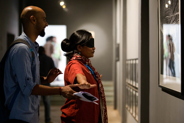 Participants in the workshop conduct exercises in art mediation_blindfold tours_in Aspinwall House, Fort Kochi.