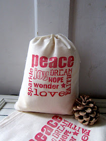 muslin gift bag that says peace joy love hope wonder dream sparkle