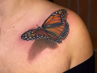 a monarch butterfly tattoo-like