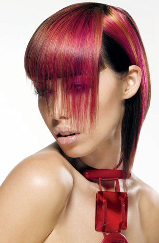 Woman short haircut with bob style with long bang, two toned red hair.