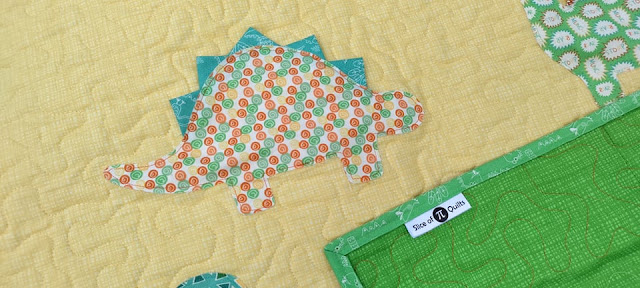 Dinosaur quilt by Slice of Pi Quilts