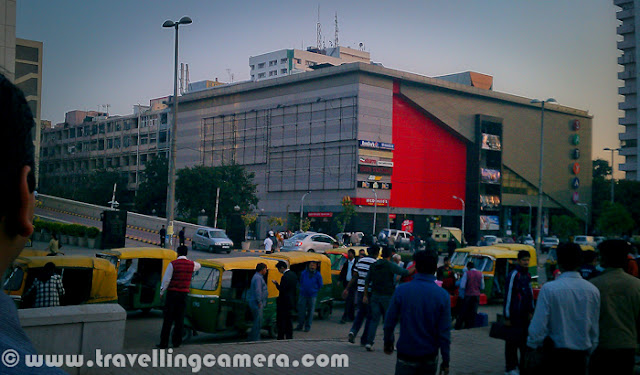 Although Nehru Place is mainly known for it's computer hardware market which is considered as largest one in Asia, but there are lot many other things to observce around this place. For now, let's have a quick Photo Journey with my HTC Desire HD and it's mainly focussed on Nehru Place Market and places visible from this part of the Delhi...-------------------------------------------------------------------------------The very first photograph of this Photo Journey shows a view of Iskon Temple which is visible from Metro Station. Nehru Place is well connected with Metro Train now, which starts from Centeral Scretriate.Here is first view after getting down from Metro Station at Nehru Place. Very Crowded places with some Autos lined up to take their clients to appropriate places, but on thier terms. Satyam Cinemas is just in front of Nehru Place Metro Station, as you can see in above Photograph. After crossing the road and Satyam Cinema, we enter into a huge Market-complex behind Satyam Cinema. This is extremely fast moving region, where everyone is rushing towards various Computer Hardware shops to check out different products with respect to specifications, cost, new technologies etcHere is typical view of Nehru Place Market where it's surrounded by multi-storey buildings from all sides. All these floors have various Computer Hardware dealers, shops and assembling service providers. In fact, there are some of the very large scale dealers for various branded computers and other equipments like Printers, Scanners, Extrenal Hard Disks etc.There is very strong network of dealers in this market, which ensures that no one is cutting much on the rates to avoid overall loss of this market. Their benefit is always in ensuring standard ranges for different types of computer components. Although customer may get higher prices, as many of them come to this market without proper home-work around the prices & configurations. I have seen many people going to this market with an impression that they get good stuff at cheaper rates and end up with cheaper rates for old configurations...There are some of the shops at Nehru Place Computer hardware Market where rate lists with appropriate specifications are pasted and you have to just order the component you want. No scope of negociations and success rate of such shops is seen much more than other dealers. As of now, I am forgetting the name of a dealer who is very popular for fixed priced computer components and located on first floor.Here is one of the sample from fixed priced shop at Nehru Place computer hardware market in national capital region of India - Delhi !!!Apart from Computer Hardware other stuff like cloths, shoes etc are also sold on the streets of Nehru Place Market. All this stuff is non-branded and most of the times low quality. But some of the use & throw electronic stuff is quite cheap in this marketApart from main computer shops and street shops, few boys can be seen roaming around this place. They sell pirated Softwares for 50 Rs to 200 Rs, depending upon the kind of software you want. At times, you can get a good deal of having 4-5 softwares in 100 rupees. Latest versions of almost all the softwares can be seen in this market. Everyone knows about this fact including government.There are some of the eating points around this place and people spend complete day in searching for right stuff. Many folks for surrounding states come to this market to buy Computer Components in whole-sale and book profits in their local regions.With all these basic details about Nehru place market, it was time to leave the place and move towards our homes. Sunset was beutiful on that day and we were missing our cameras at this point of time, but still HTC Desire helped in capturing these moments for usNehru Place market is surrounded by some of the other intersting places like Bahai's Temple (Lotus Temple) and Iskon Temple. Lotus temple is one of the main tourist places in Delhi, India and Iskon Temple is a paradise for peace lovers. It's exactly in Kailash Coloy from where Lotus temple is also clearly visible. There are some light and sound shows at this temple, which are mainly around stories of Radhe Krishna