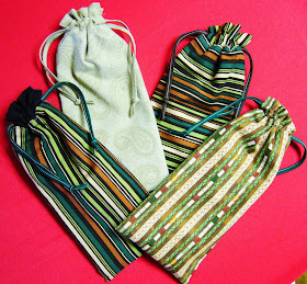 Reversible drawstring pencil pouches.