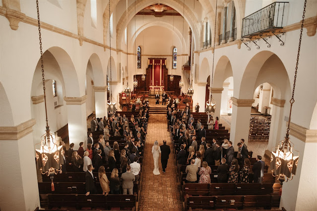 bride and dad walking into ceremony