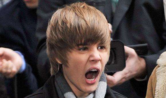 JUSTIN BIEBER FALLS OFF STAGE justin bieber on stage singing. JUSTIN BIEBER FALLS OFF STAGE