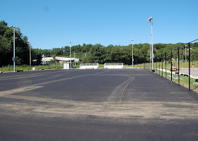 tennis courts, appears to be room for 4 set