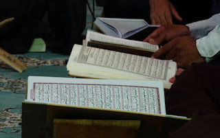 membaca Al Qur'an