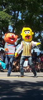 Bert and Ernie from Sesame Street holding hands with a marriage contract