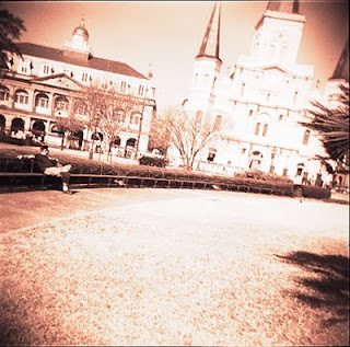 the same gulf-coast mission style buildings with a rosy tint.