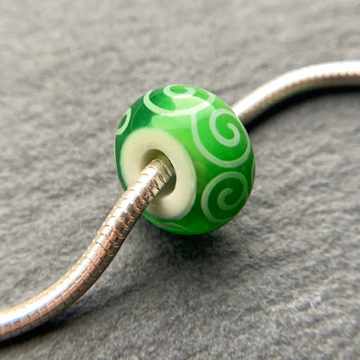 Handmade lampwork glass big hole bead by Laura Sparling made with CiM Avonlea