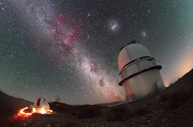 Milky Way Galaxy, Large Magellanic Cloud Galaxy and Small Magellanic Cloud Galaxy above La Silla Observatory in Chile