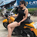 Photo Story: Hot Beauty On Costly Bike