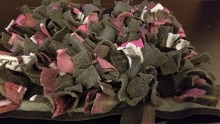 The finished snuffle mat in gray and pink.