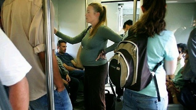 Pregnat Woman on the Bus