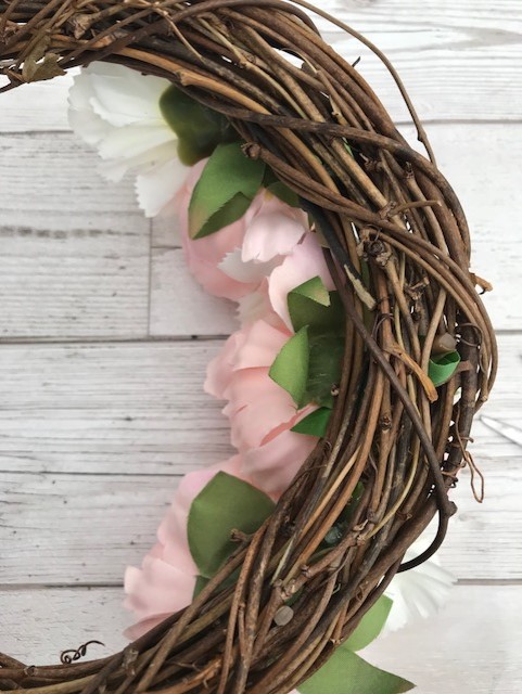 The back of the wreath with the stems cut shorter