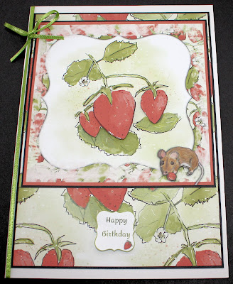 Photo of a Card featuring a drawing of ripe strawberries, and a mouse who has just stolen one of them.