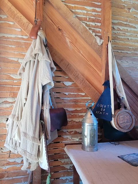 Canteen, lantern, shirts, and Liberty cap