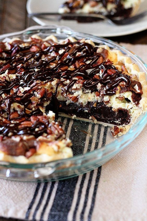 This fudgy top-prize winning Cream Cheese Brownie Pie needs nothing more than an ice-cold glass of milk to make a perfect ending to any meal.