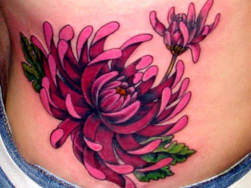 goldfish tattoo. flower tattoos design