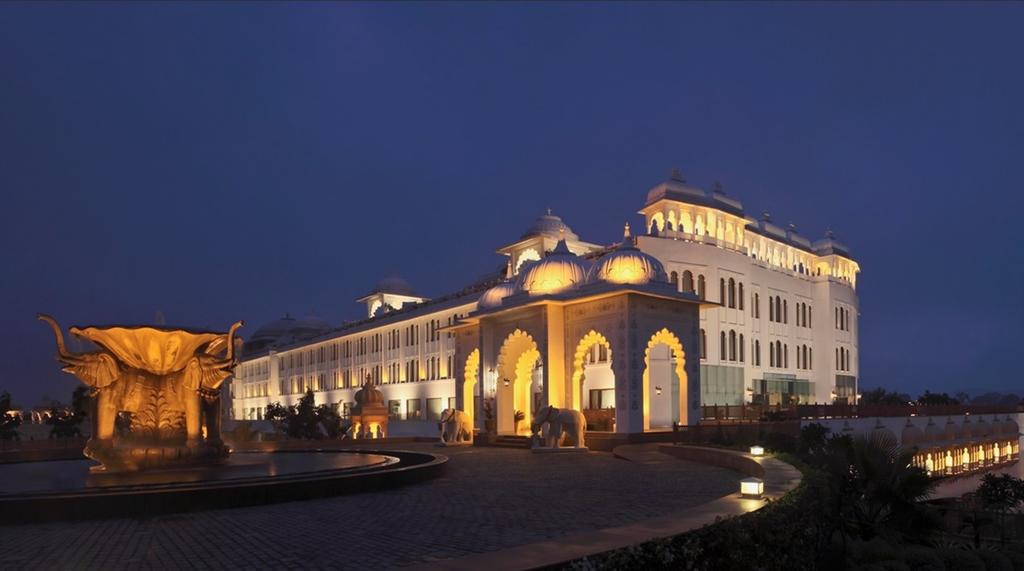 Radisson Blu Udaipur Palace Resort & Spa Udaipur Offering an outdoor swimming pool, a fitness centre and a spa and wellness centre, Radisson Blu Udaipur Palace Resort & Spa is located in Udaipur. Free WiFi access is available in the public areas of this resort.  The elegant air-conditioned accommodation will provide you with a flat-screen satellite TV, minibar and a seating area. Featuring a shower, private bathroom also comes with a bath and a hairdryer.  At Radisson Blu Udaipur Palace Resort & Spa you will find a tennis court and a sauna and massage parlour. A lush green garden is available for guests to take a leisure stroll. Other facilities offered at the property include tour desk and luggage storage. The property offers free parking.  If you feel like visiting the surroundings, check out the beautiful Fateh Sagar Lake and the architectural marvels of City Palace and the Monsoon Palace that are within 8 km. This resort is 6 km from the Udaipur Bus Station, 12 km from the Udaipur Railway Station and 26 km from Maharana Pratap Airport.  Dining options include Neel Mahal that serves Indian and continental cuisine while the WOK by Lake serves Oriental cuisine. Refreshing beverages can be enjoyed at the H20.“Aangan” – Our Lobby bar & “Aravali” – The Roof Top Barbeque and Grill Restaurant overlooking the Fatehsagar lake. Private dining is possible with 24-hour room service. HomeUdaipur HotelTaj Aravali Resort & Spa Udaipur Taj Aravali Resort & Spa Udaipur 6:32:00 PM Taj Aravali Resort & Spa Udaipur - Positioned on a dramatic landscape in the state of Mewar and spread over 27 acres surrounded by the Aravali Ranges, Taj Aravali Resort & Spa has an outdoor swimming pool and a fitness centre.  Inspired by Rajasthani architecture and nomadic culture, all rooms in the hotel are equipped with air-conditioning and a flat-screen TV. Free Wifi is available at the resort.  The property has an all-day diner, a specialty pure vegetarian restaurant, an alfresco grill and bar overlooking the swimming pool and manicured gardens. A continental breakfast is served each morning at the property.  Guests can play squash, badminton, basketball, tennis and use the indoor golf simulator at the property. It also includes a 34 seater movie theatre and a Jiva Spa housed in its own block.  Taj Aravali Resort & Spa is 6 km from Bagore ki Haveli and Jagdish temple. Maharana Pratap Airport is 33 km away, For Booking Call us on 8000999660, 9427703236.  Ground Floor-11, Vishwas Shopping Center Part-1, R.C.Technical Road, Ghatlodia, Ahmedabad - 380061. Contact No. : +91-8000999660, +91-9427703236 E-mail : travel@aksharonline.com Website : www.aksharonline.com,  AIR TICKETING All Domestic & International GDS & LCC Flight Booking Group Fare / Individual Fare / Student Fare / Corporate Fare and more... RAILWAY TICKETING  HOTEL BOOKING All Budget & Premium - Domestic & International Hotel Booking BUS TICKETING Daily Service Bus Ticketing – All Major Operators Available Across India GSRTC Bus Ticket Booking PASSPORT SERVICES Fresh Passport / Renew Passport /Police Clearance Certificate / Correction in Passport / Changes in Particular Details VISA SERVICES Tourist Visa - USA, UK, CANADA, AUSTRALIA, SINGAPORE, DUBAI, MALAYSIA, THAILAND & More... TOUR PACKAGES Domestic & International Tour Packages MONEY TRANSFER SERVICES Western Union (Receive Money From Abroad in Few Minutes) Transfast (Received Money From Abroad) Domestic Money Transfer - Money Transfer in India REMMITANCE SERVICES (Wire Transfer - TT) Education Remmitance Family Maintenance Forex Card (New/Reload) INSURANCE SERVICES Travel-Overseas Insurance (BhartiAxa, ICICI, Bajaj, Digit, Religare, Reliance, TataAIA & More...) HDFC Life Insurance Services CAR/BUS RENTAL Tavera, Innova, Xylo, Indica, Indigo & More…Across India  UTILITY BILL PAYMENT  Landline & Mobile Bill Payment – Tata, Reliance, BSNL, Idea, Airtel, Vodafone & More...  Electricity Bill Payment – Torrent Power, UGVCL & More..  Gas Bill Payment – Adani Gas Ltd., Gujarat Gas, Mahanagar Gas(Mumbai)  Insurance Premium Collection – LIC, Aviva Life Insurance, Kotak Life Insurance, Max Newyork Life Insurance, Birla Sun Life, Reliance Life Insurance, DLF Pramerica Life Insurance, Exide Life Insurance, ICICI Pru Life Insurance, TATA AIA Life Insurance, Bajaj Allianz Life Insurance, L and T General Insurance | Call us on 8000999660 (Mitesh Patel) E-mail : mybooking@live.in  MountAbu @ Cama Rajputana Club Resort @ Mount View Hotel @ WelcomHeritage Connaught House - Mount Abu  @ Sterling Resort - MountAbu @ Hotel Hillock MountAbu @ Hotel Hilltone @ Hummingbird Resorts - MountAbu @ Lake Palace Mountabu & more...   Call us on 8000999660 (Mitesh Patel) E-mail : mybooking@live.in  Udaipur @ Aurika (By LemonTree) @ Ananta Resort & Spa @ Radisson Blu Udaipur Palace Resort and Spa @ Justa Rajputana Resort @ Justa Sajjangarh @ Spectrum Resort @ Tulip Le Garden @ Hill Garden Retreat @ Ramada Udaipur @ TatSarssa Udaipur @ Ramya Resort @ Bamboosaa Resort @ Devra @ Araliya Resort & Spa @ Treehouse Atulya Niwas @ Shikarbadi Hotel by HRH @ Maharana Bagh @ Shiv Niwas Palace by HRH @ The Lalit Laxmi Vilas Palace @ Park Exotica @ Prem Kunj @ Bhairavgarh Resort Udaipur @ Royal Retreat Udaipur @ Shouryagarh Resort @ ClubMahindra Udaipur @ Valley View Resort @ Barabagh @ DevShree Resort @ Aurika Resort Udaipur & more...    Call us on 8000999660 (Mitesh Patel) E-mail : mybooking@live.in  Kumbhalgarh @ Alcor Spa Resort @ The Aodhi @ Everest Hill Resort @ Fateh Safari Lodge @ Kumbhabagh @ Kumbha Residency @ Kumbhalgarh Safari Camp @ MahuaBagh Resort @ Ramada Kumbhalgarh @ The Wild Retreat @ FatehBagh @ KingsAbode @ Kanj Haveli Resort @ Kumbhalgarh Forest Retreat @ Via Lakhela Resort & Spa @ The G MountValley Resort @ Mana Resort - Ranakpur @ Maharanibagh - Ranakpur & more...  Call us on 8000999660 (Mitesh Patel) E-mail : mybooking@live.in  Taj Aravali Resort & Spa Udaipur - Positioned on a dramatic landscape in the state of Mewar and spread over 27 acres surrounded by the Aravali Ranges, Taj Aravali Resort & Spa has an outdoor swimming pool and a fitness centre.  Inspired by Rajasthani architecture and nomadic culture, all rooms in the hotel are equipped with air-conditioning and a flat-screen TV. Free Wifi is available at the resort.  The property has an all-day diner, a specialty pure vegetarian restaurant, an alfresco grill and bar overlooking the swimming pool and manicured gardens. A continental breakfast is served each morning at the property.  Guests can play squash, badminton, basketball, tennis and use the indoor golf simulator at the property. It also includes a 34 seater movie theatre and a Jiva Spa housed in its own block.  Taj Aravali Resort & Spa is 6 km from Bagore ki Haveli and Jagdish temple. Maharana Pratap Airport is 33 km away, For Booking Call us on 8000999660, 9427703236.  Ground Floor-11, Vishwas Shopping Center Part-1, R.C.Technical Road, Ghatlodia, Ahmedabad - 380061. Contact No. : +91-8000999660, +91-9427703236 E-mail : travel@aksharonline.com Website : www.aksharonline.com,  AIR TICKETING All Domestic & International GDS & LCC Flight Booking Group Fare / Individual Fare / Student Fare / Corporate Fare and more... RAILWAY TICKETING  HOTEL BOOKING All Budget & Premium - Domestic & International Hotel Booking BUS TICKETING Daily Service Bus Ticketing – All Major Operators Available Across India GSRTC Bus Ticket Booking PASSPORT SERVICES Fresh Passport / Renew Passport /Police Clearance Certificate / Correction in Passport / Changes in Particular Details VISA SERVICES Tourist Visa - USA, UK, CANADA, AUSTRALIA, SINGAPORE, DUBAI, MALAYSIA, THAILAND & More... TOUR PACKAGES Domestic & International Tour Packages MONEY TRANSFER SERVICES Western Union (Receive Money From Abroad in Few Minutes) Transfast (Received Money From Abroad) Domestic Money Transfer - Money Transfer in India REMMITANCE SERVICES (Wire Transfer - TT) Education Remmitance Family Maintenance Forex Card (New/Reload) INSURANCE SERVICES Travel-Overseas Insurance (BhartiAxa, ICICI, Bajaj, Digit, Religare, Reliance, TataAIA & More...) HDFC Life Insurance Services CAR/BUS RENTAL Tavera, Innova, Xylo, Indica, Indigo & More…Across India  UTILITY BILL PAYMENT  Landline & Mobile Bill Payment – Tata, Reliance, BSNL, Idea, Airtel, Vodafone & More...  Electricity Bill Payment – Torrent Power, UGVCL & More..  Gas Bill Payment – Adani Gas Ltd., Gujarat Gas, Mahanagar Gas(Mumbai)  Insurance Premium Collection – LIC, Aviva Life Insurance, Kotak Life Insurance, Max Newyork Life Insurance, Birla Sun Life, Reliance Life Insurance, DLF Pramerica Life Insurance, Exide Life Insurance, ICICI Pru Life Insurance, TATA AIA Life Insurance, Bajaj Allianz Life Insurance, L and T General Insurance      Taj Aravali Resort & Spa Udaipur - Positioned on a dramatic landscape in the state of Mewar and spread over 27 acres surrounded by the Aravali Ranges, Taj Aravali Resort & Spa has an outdoor swimming pool and a fitness centre.  Inspired by Rajasthani architecture and nomadic culture, all rooms in the hotel are equipped with air-conditioning and a flat-screen TV. Free Wifi is available at the resort.  The property has an all-day diner, a specialty pure vegetarian restaurant, an alfresco grill and bar overlooking the swimming pool and manicured gardens. A continental breakfast is served each morning at the property.  Guests can play squash, badminton, basketball, tennis and use the indoor golf simulator at the property. It also includes a 34 seater movie theatre and a Jiva Spa housed in its own block.  Taj Aravali Resort & Spa is 6 km from Bagore ki Haveli and Jagdish temple. Maharana Pratap Airport is 33 km away, For Booking Call us on 8000999660, 9427703236.  Ground Floor-11, Vishwas Shopping Center Part-1, R.C.Technical Road, Ghatlodia, Ahmedabad - 380061. Contact No. : +91-8000999660, +91-9427703236 E-mail : travel@aksharonline.com Website : www.aksharonline.com,  AIR TICKETING All Domestic & International GDS & LCC Flight Booking Group Fare / Individual Fare / Student Fare / Corporate Fare and more... RAILWAY TICKETING  HOTEL BOOKING All Budget & Premium - Domestic & International Hotel Booking BUS TICKETING Daily Service Bus Ticketing – All Major Operators Available Across India GSRTC Bus Ticket Booking PASSPORT SERVICES Fresh Passport / Renew Passport /Police Clearance Certificate / Correction in Passport / Changes in Particular Details VISA SERVICES Tourist Visa - USA, UK, CANADA, AUSTRALIA, SINGAPORE, DUBAI, MALAYSIA, THAILAND & More... TOUR PACKAGES Domestic & International Tour Packages MONEY TRANSFER SERVICES Western Union (Receive Money From Abroad in Few Minutes) Transfast (Received Money From Abroad) Domestic Money Transfer - Money Transfer in India REMMITANCE SERVICES (Wire Transfer - TT) Education Remmitance Family Maintenance Forex Card (New/Reload) INSURANCE SERVICES Travel-Overseas Insurance (BhartiAxa, ICICI, Bajaj, Digit, Religare, Reliance, TataAIA & More...) HDFC Life Insurance Services CAR/BUS RENTAL Tavera, Innova, Xylo, Indica, Indigo & More…Across India  UTILITY BILL PAYMENT  Landline & Mobile Bill Payment – Tata, Reliance, BSNL, Idea, Airtel, Vodafone & More...  Electricity Bill Payment – Torrent Power, UGVCL & More..  Gas Bill Payment – Adani Gas Ltd., Gujarat Gas, Mahanagar Gas(Mumbai)  Insurance Premium Collection – LIC, Aviva Life Insurance, Kotak Life Insurance, Max Newyork Life Insurance, Birla Sun Life, Reliance Life Insurance, DLF Pramerica Life Insurance, Exide Life Insurance, ICICI Pru Life Insurance, TATA AIA Life Insurance, Bajaj Allianz Life Insurance, L and T General Insurance