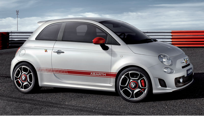 fiat 500 abarth running on the road
