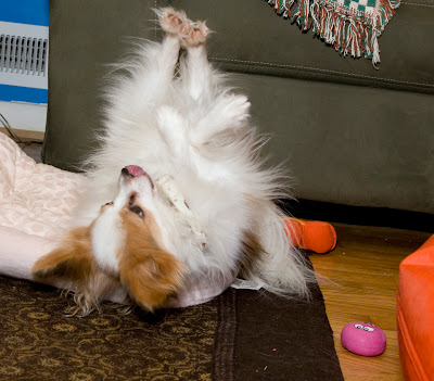 Chance breakdances with his pink face toy (right)