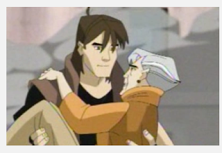 Lance, a shaggy haired young man in a brown vest, carrying an old woman in his arms.