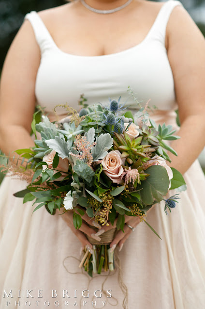 Bride with succulent bridal bouquet