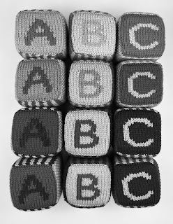 grayscale version of hand knit abc 123 foam blocks in green, blue, pink, yellow, red