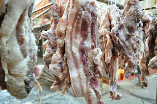 Salted pork being sun dried