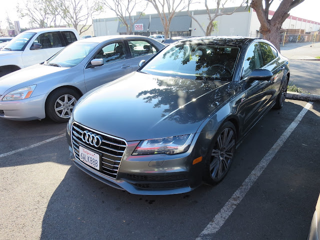 Audi A7 after dent repaired in hood prior at Almost Everything Auto Body