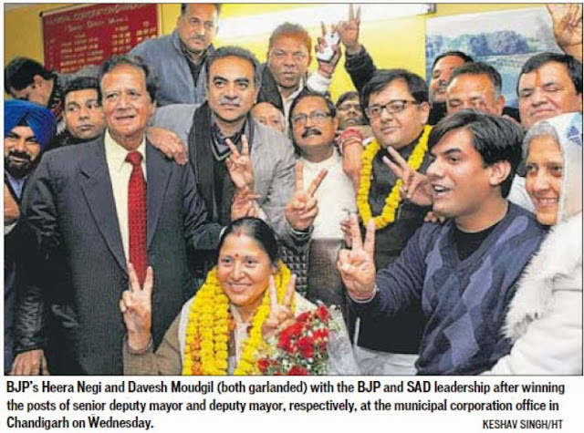 BJP's Heera Negi and Davesh Moudgil (both garlanded) with the BJP and SAD leadership after winning the post of Senior Deputy Mayor and Deputy Mayor, respectively, at the Municipal Corporation office in Chandigarh on Wednesday.